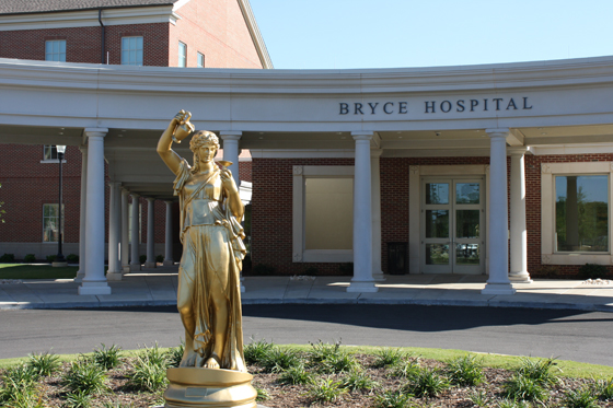 A statue of Hebe, the Greek Goddess of Youth, that is on display in front of the entrance of Bryce Hospital.
