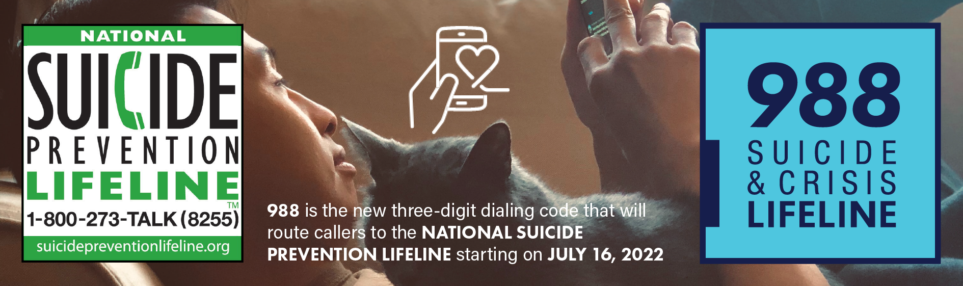 988 Suicide & Crisis Lifeline. Man on couch, cuddling with cat and looking at cell phone.