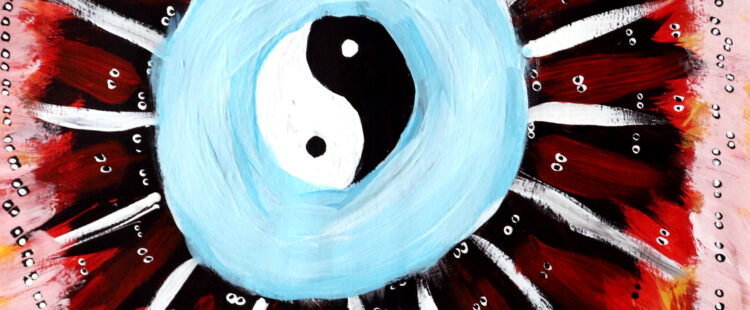 a yin yang symbol surrounded by tiny bubbles