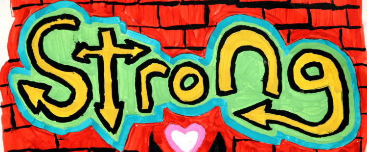 stylized version of the word 'strong' painted on a brick wall