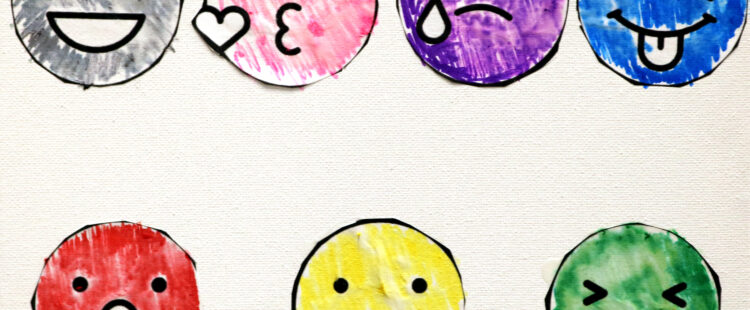 several smiley faces with varied expressions