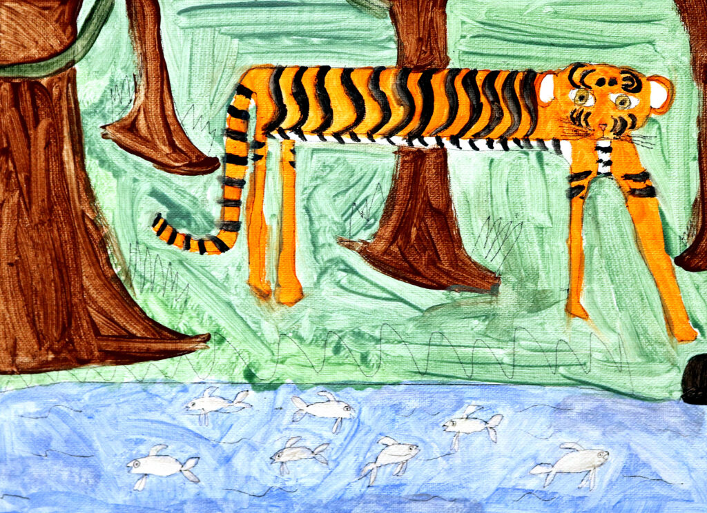 a tiger near a river with fish