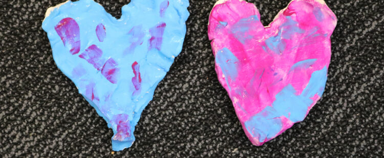 sculptures of hearts in pink and blue