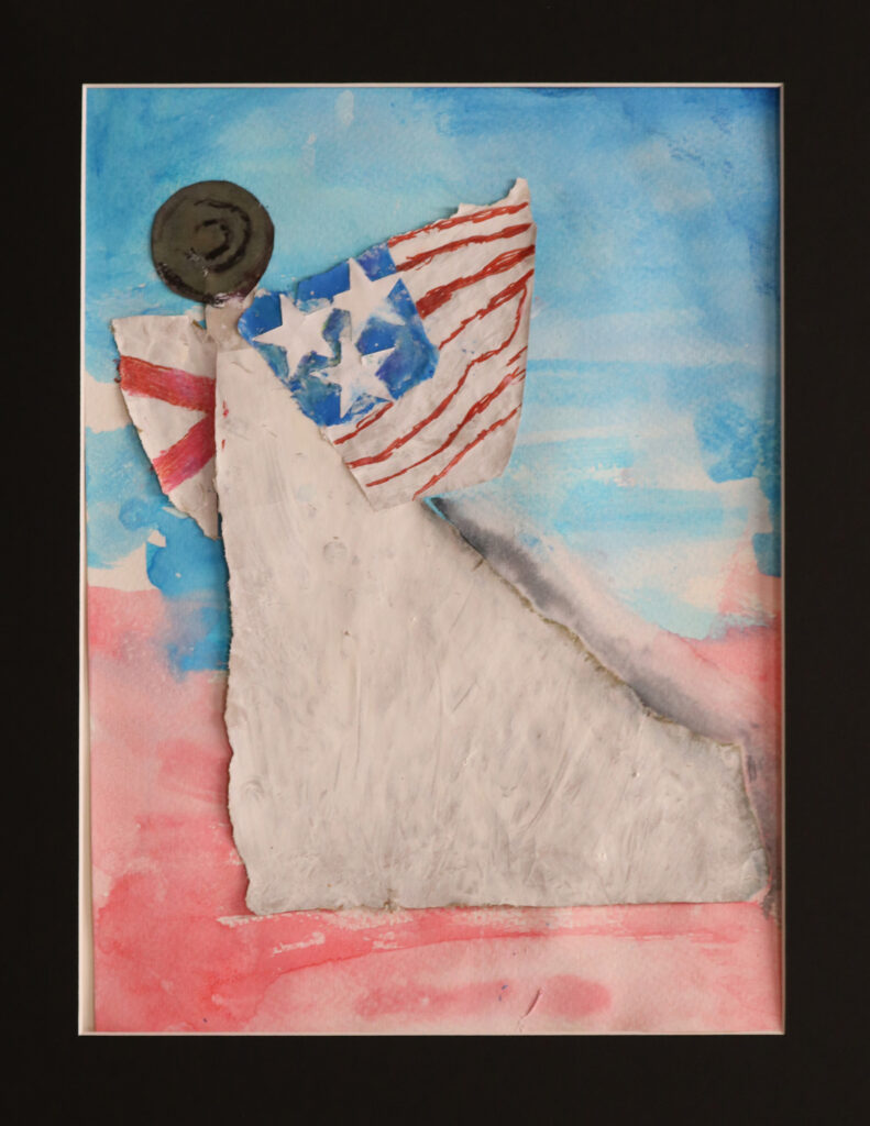 an angel figure with both the American flag and the Alabama state flag