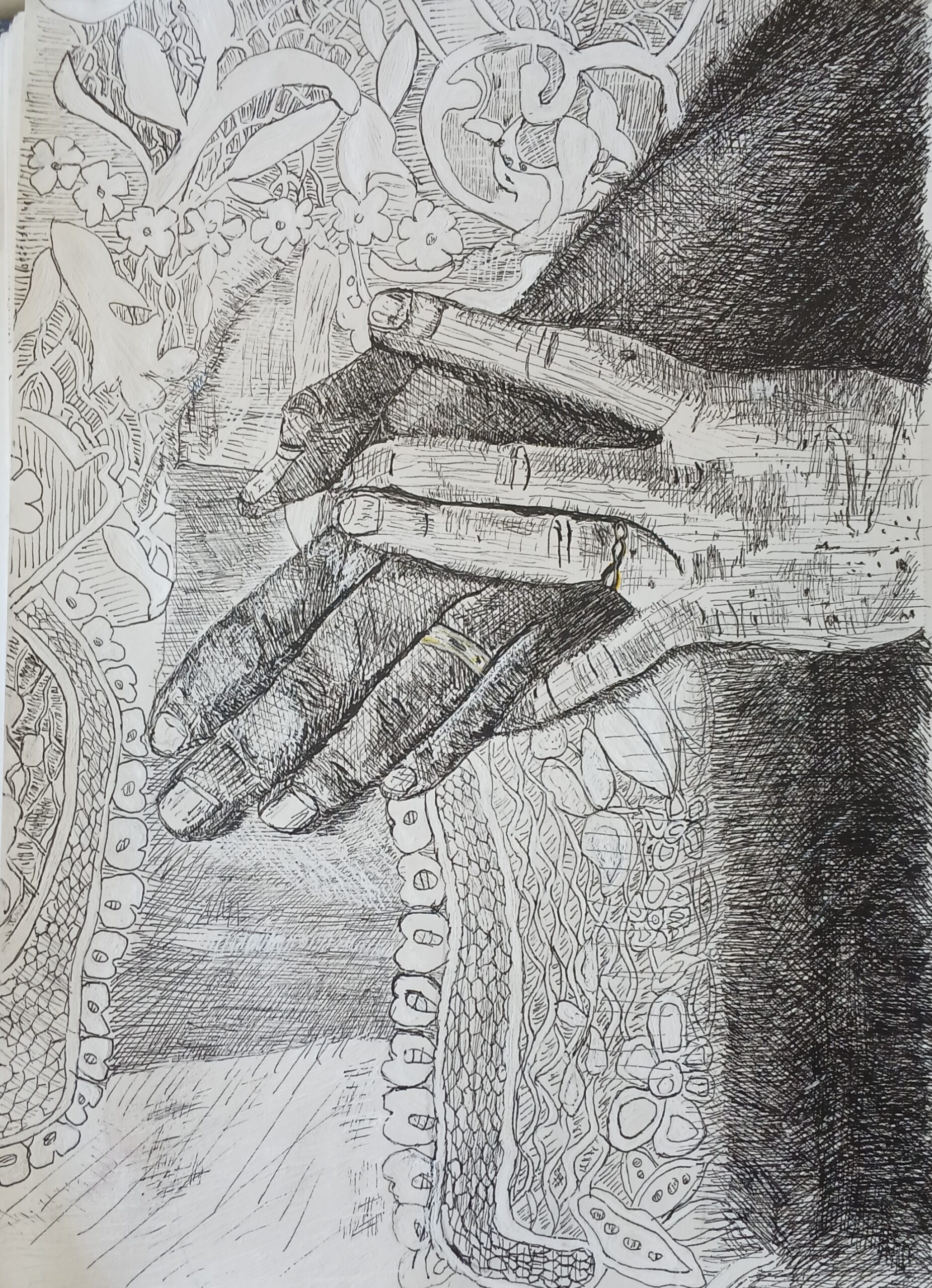two hands over some fabric